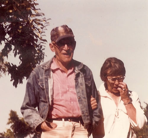 Charles and Louise Castles in front of the Almond Tree